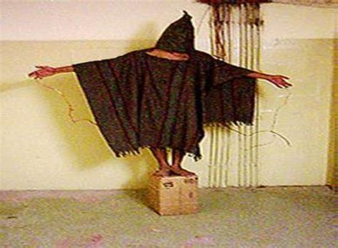 Hooded at Abu Ghraib, but not in the picture